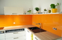 Bild einer Glasrückwand in Orange